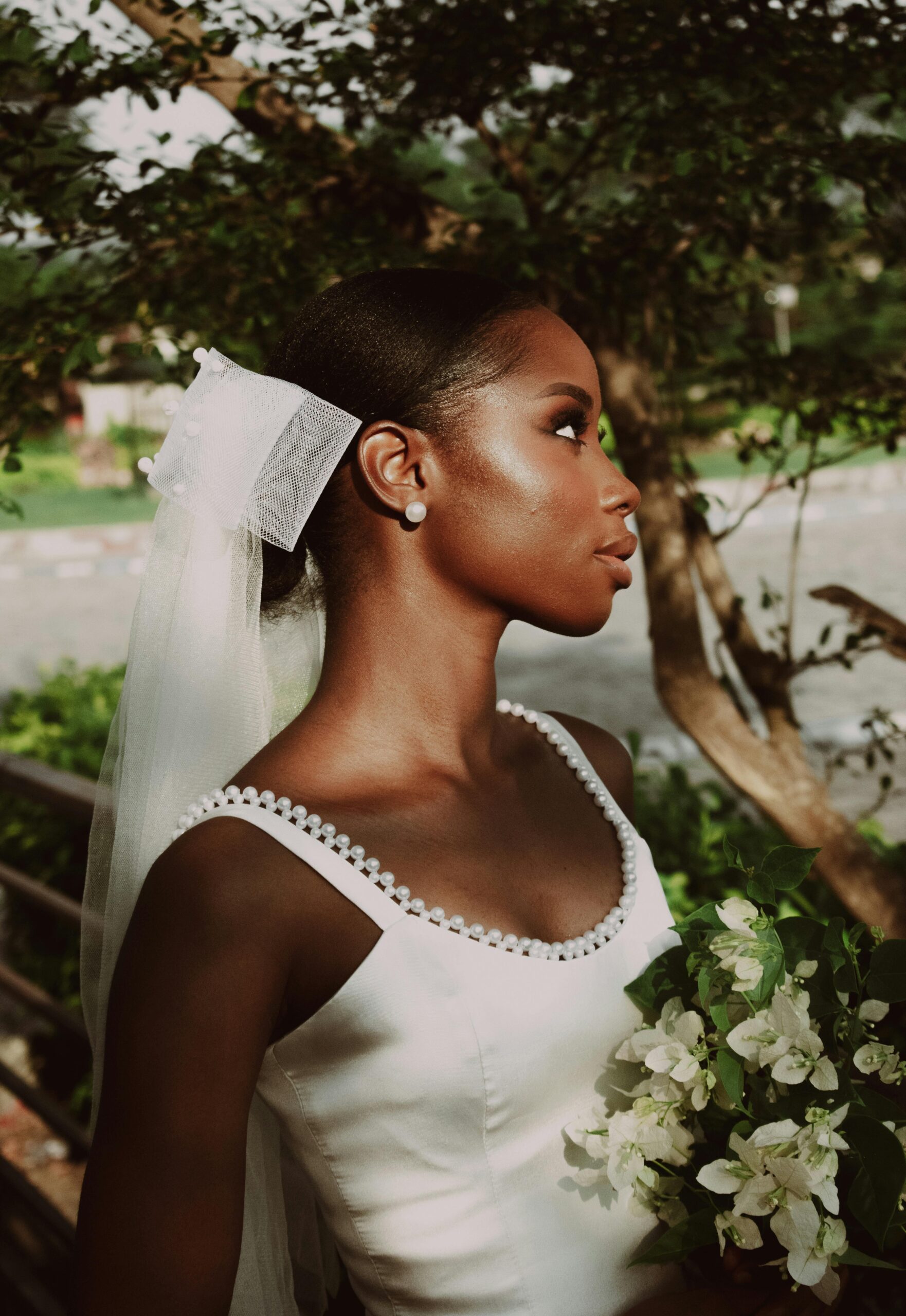 Wedding photographer capturing a beachside elopement at golden hour, symbolizing visibility, connection, and destination searchability for SEO-focused websites.