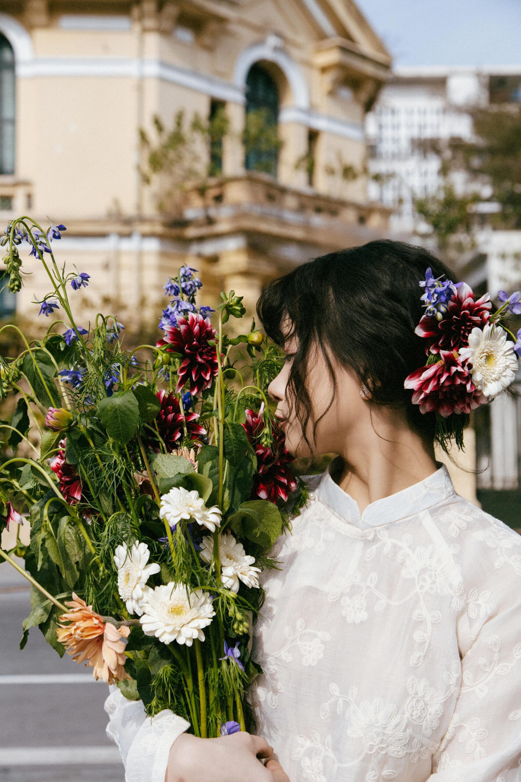 A wedding photographer writing blog content with a camera and notes nearby—illustrating how blogging can build trust and increase client inquiries online.