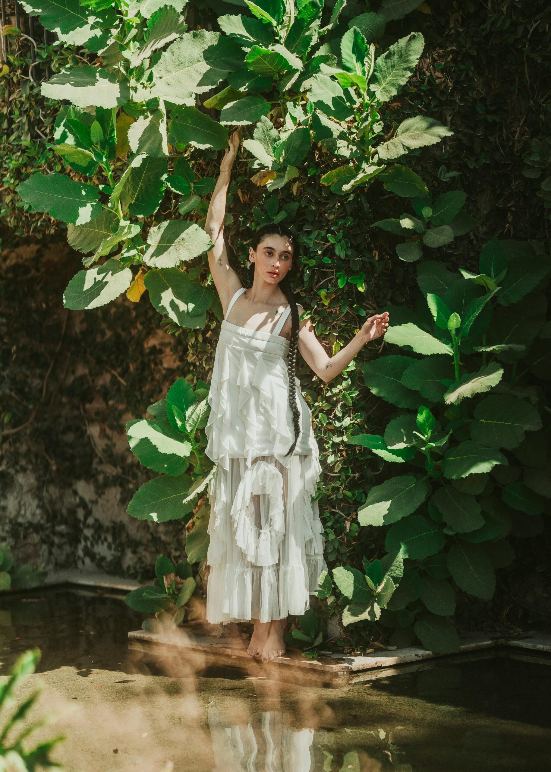Creative bridal portrait in natural light with bold editorial styling, symbolizing the importance of avoiding SEO mistakes to stand out as a modern wedding photographer online.