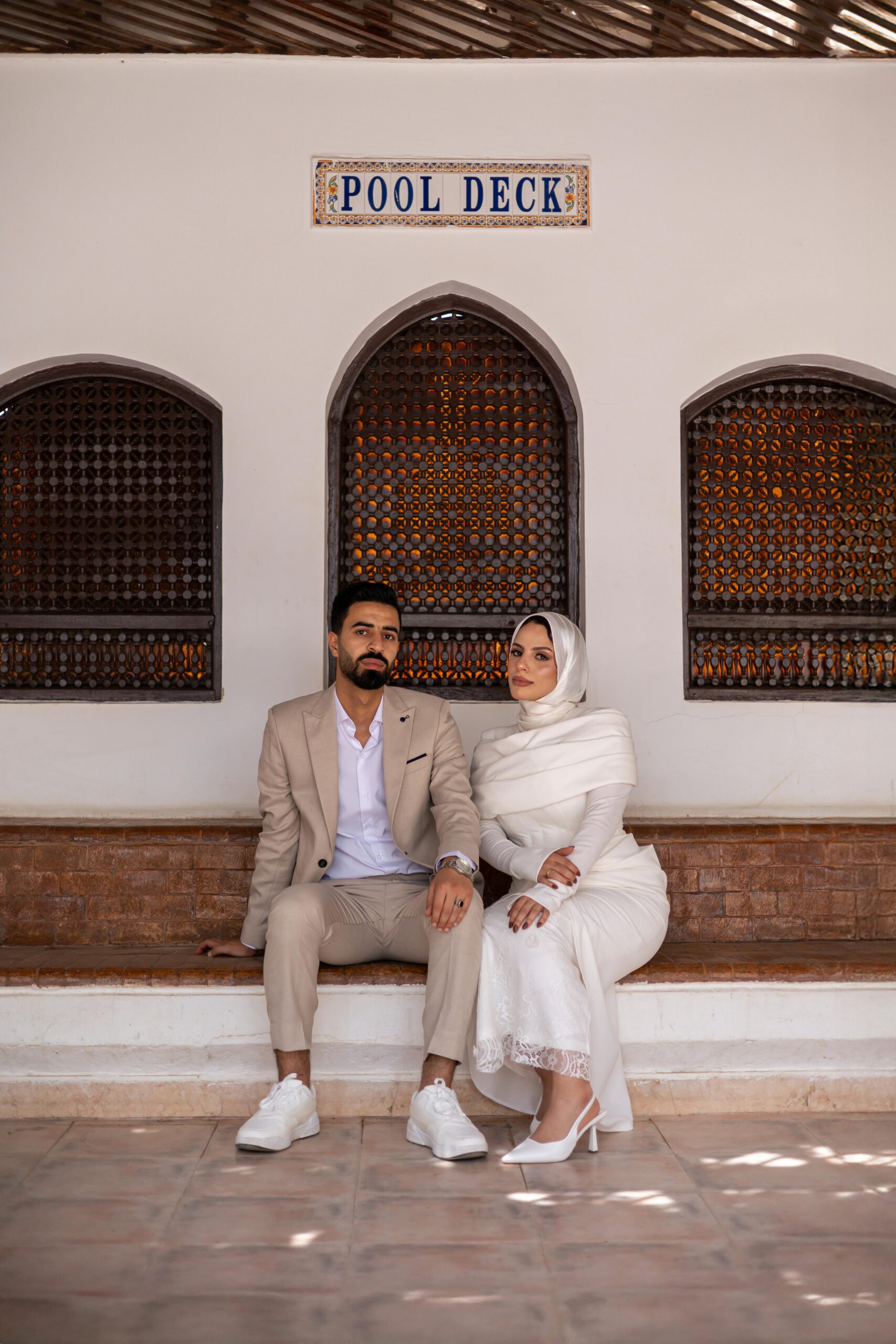 Split-screen image showing a beautiful wedding photography homepage on one side and a backend site audit or Google search console on the other, highlighting the disconnect between design and SEO structure.